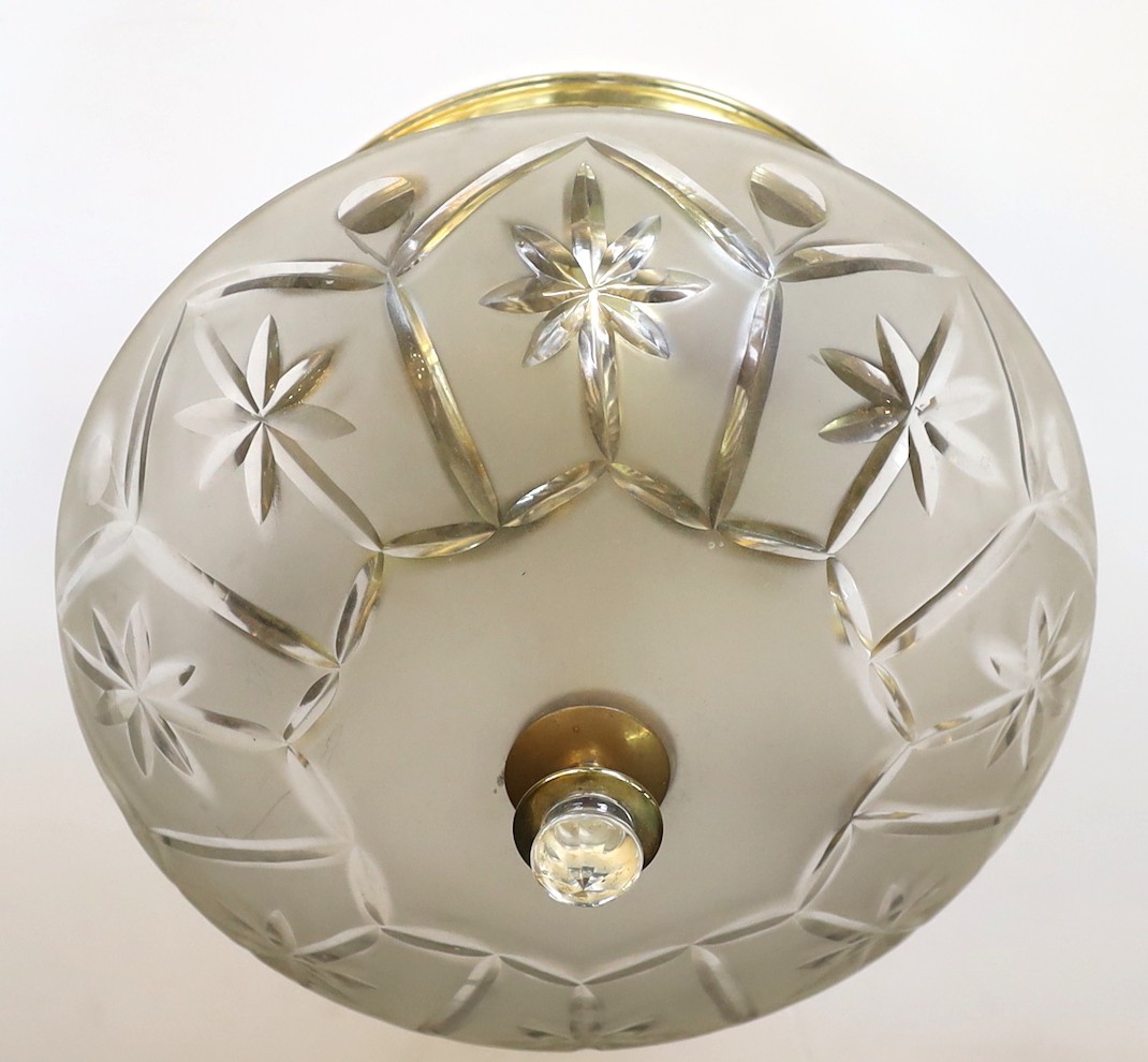 A 1950s French brass cut and etched glass ceiling light, height 27cm. diameter 30cm